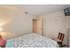Cozy bedroom with light walls, ample closet space, and bright floral bedding at 2256 Auburn Blvd, Port Charlotte, FL 33948