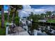 Private boat dock equipped with a lift and space for entertaining along the canal at 2256 Auburn Blvd, Port Charlotte, FL 33948