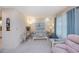 Bright living room featuring comfortable seating, stylish decor and ample natural light at 2256 Auburn Blvd, Port Charlotte, FL 33948