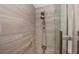 Shower with tile surround, rainfall showerhead, and grab bar at 2256 Auburn Blvd, Port Charlotte, FL 33948