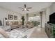 Relaxing living room with comfortable furniture and access to a patio at 7457 W Lenox Cir, Punta Gorda, FL 33950