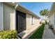 Private walkway leading to the front door of the home at 7457 W Lenox Cir, Punta Gorda, FL 33950