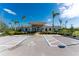 Community clubhouse with ample parking at 7457 W Lenox Cir, Punta Gorda, FL 33950