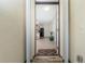 Exterior front door entrance with a screen door at 7457 W Lenox Cir, Punta Gorda, FL 33950