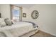 Charming bedroom with a double bed and large window at 7457 W Lenox Cir, Punta Gorda, FL 33950