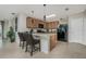 Modern kitchen with black appliances and wood cabinets at 7457 W Lenox Cir, Punta Gorda, FL 33950