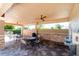 Covered patio area with tables and water fountains at 7457 W Lenox Cir, Punta Gorda, FL 33950