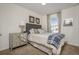Cozy bedroom with a double bed and stylish nightstand at 7457 W Lenox Cir, Punta Gorda, FL 33950
