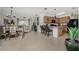 Open kitchen with modern appliances and a breakfast bar at 7457 W Lenox Cir, Punta Gorda, FL 33950