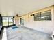 Covered patio with a ceiling fan at 2673 Greendale Rd, North Port, FL 34287