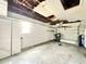 Unfinished garage with water damage to ceiling at 2673 Greendale Rd, North Port, FL 34287
