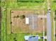 Single Gathering home with a large backyard and a canal nearby at 2673 Greendale Rd, North Port, FL 34287