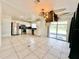 Kitchen features stainless steel appliances and tile floors at 2673 Greendale Rd, North Port, FL 34287