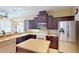 Kitchen boasts stainless steel appliances at 6913 Talon Bay Dr, North Port, FL 34287