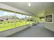 Relaxing screened porch overlooks a grassy backyard at 20222 Banner Ave, Port Charlotte, FL 33952