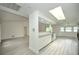 Newly renovated kitchen with white shaker cabinets, granite countertops, and stainless steel appliances at 20222 Banner Ave, Port Charlotte, FL 33952