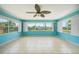 Sun-filled Florida room offering water views and tile floors at 29165 Orva Dr, Punta Gorda, FL 33982