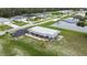 Single-story gray house near lake and community at 108 Boundary Blvd # A&B, Rotonda West, FL 33947