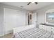 Bedroom with double bed, large closet, and access to a hallway at 108 Boundary Blvd # A&B, Rotonda West, FL 33947