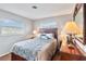 Bedroom with double bed, wood furniture, and window at 108 Boundary Blvd # A&B, Rotonda West, FL 33947