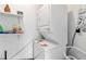 Convenient laundry room with stackable washer and dryer at 108 Boundary Blvd # A&B, Rotonda West, FL 33947