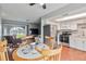 Dining area with view into kitchen and living room at 108 Boundary Blvd # A&B, Rotonda West, FL 33947