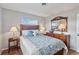 Guest bedroom with a double bed and wood dresser at 108 Boundary Blvd # A&B, Rotonda West, FL 33947