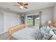 Serene bedroom with water views, a ceiling fan, and a comfortable bed at 108 Boundary Blvd # A&B, Rotonda West, FL 33947