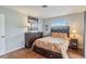 Bright bedroom with a comfortable double bed and wood dresser at 108 Boundary Blvd # A&B, Rotonda West, FL 33947