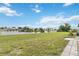 Spacious backyard with a view of a peaceful canal at 108 Boundary Blvd # A&B, Rotonda West, FL 33947