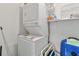 Stackable washer and dryer in convenient laundry closet at 108 Boundary Blvd # A&B, Rotonda West, FL 33947