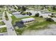 Aerial view of canal-front property with home, showcasing the neighborhood and waterfront at 108 Boundary Blvd # A&B, Rotonda West, FL 33947