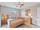 Cozy bedroom with a queen-size bed and lots of natural light at 108 Boundary Blvd # A&B, Rotonda West, FL 33947