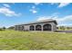 House exterior with a long screened in porch at 108 Boundary Blvd # A&B, Rotonda West, FL 33947