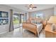 Spacious main bedroom with water views, a ceiling fan, and built-in dresser at 108 Boundary Blvd # A&B, Rotonda West, FL 33947