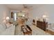 Spacious living room featuring comfortable seating and a view into the kitchen at 3251 White Ibis Ct # C4, Punta Gorda, FL 33950
