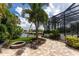 Inviting patio with fire pit and pool access at 28 Colony Point Dr, Punta Gorda, FL 33950