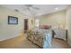 Charming bedroom with a double bed and ensuite bathroom access at 28 Colony Point Dr, Punta Gorda, FL 33950