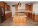 Spacious kitchen with large island and granite countertops at 28 Colony Point Dr, Punta Gorda, FL 33950