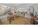Bright and airy living area featuring a comfortable seating arrangement and a view of the kitchen at 28 Colony Point Dr, Punta Gorda, FL 33950