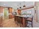Gourmet kitchen with granite countertops and island seating at 28 Colony Point Dr, Punta Gorda, FL 33950