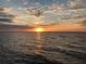 Breathtaking sunset view over the water, from the property at 28 Colony Point Dr, Punta Gorda, FL 33950