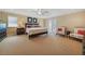 King-size bed, two armchairs, and ample space in this Primary bedroom at 28 Colony Point Dr, Punta Gorda, FL 33950