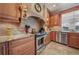 Well-equipped kitchen with granite counters and custom cabinetry at 28 Colony Point Dr, Punta Gorda, FL 33950