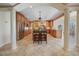 Spacious kitchen with island, granite countertops, and stainless steel appliances at 28 Colony Point Dr, Punta Gorda, FL 33950