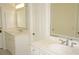 Elegant bathroom with double vanity and marble countertops at 28 Colony Point Dr, Punta Gorda, FL 33950