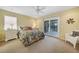 Bedroom with a double bed and sliding glass doors to balcony at 28 Colony Point Dr, Punta Gorda, FL 33950
