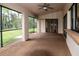 Spacious screened porch overlooking backyard at 1565 Dorchester St, Port Charlotte, FL 33952