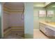 Bathroom with shower stall and double vanity at 1565 Dorchester St, Port Charlotte, FL 33952