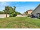 Large backyard with grassy area and hammock at 10331 Celtic Ash Dr, Ruskin, FL 33573